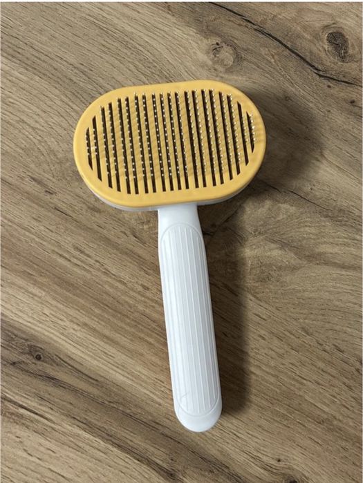 Пуходерка розчіска гребінець для собак та котів