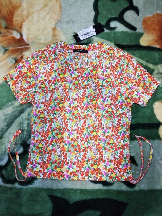 Футболка оранжевая в цветочек на девочку 140-146см