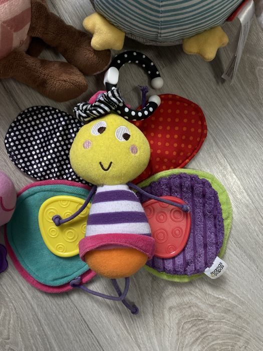 Музичні іграшки на каляску тканинна книжечка моя ферма