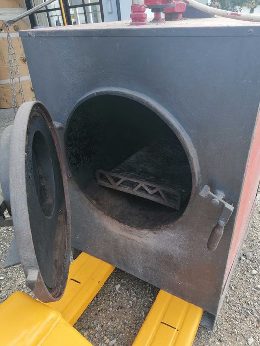 Vendo fogão a lenha usado para aquecimento central.