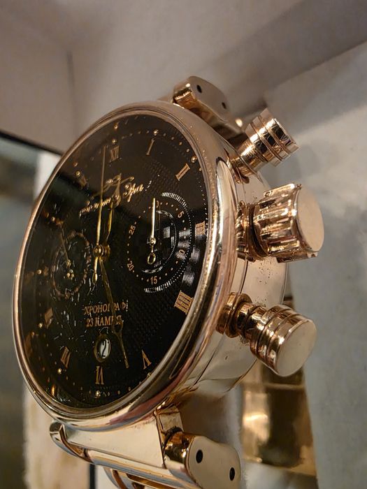 Золотые часы с браслетом