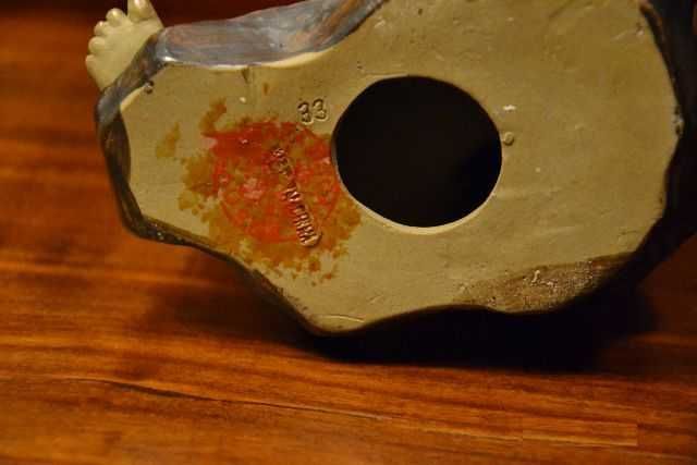 Figura de pescador chinês com peixe