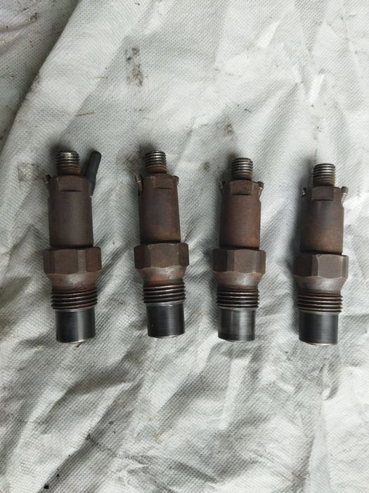 Форсунки від мотора форд ескорт 1.6 дизель