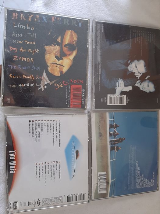 C. d. música originais como novos