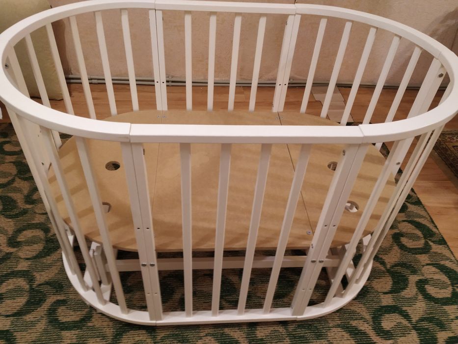 Манеж трансформер с маятниковым механизмом