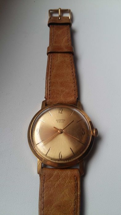 Zegarek WOSTOK 18 JEWELS złoty-au 20 ładny stan.