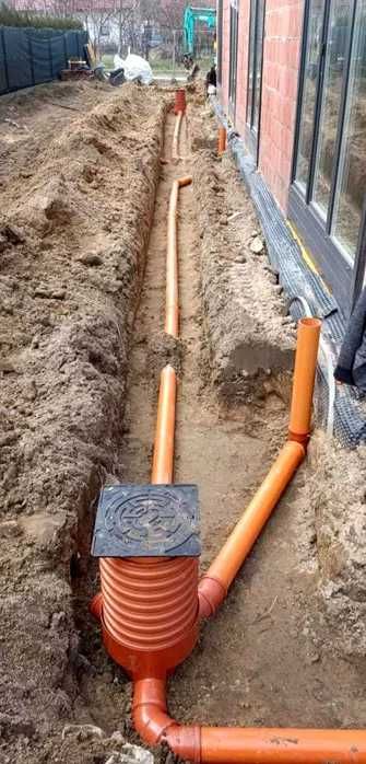 Prace zimne , koparka, koparko-ładowarka, przyłącza wod-kan, szamba,