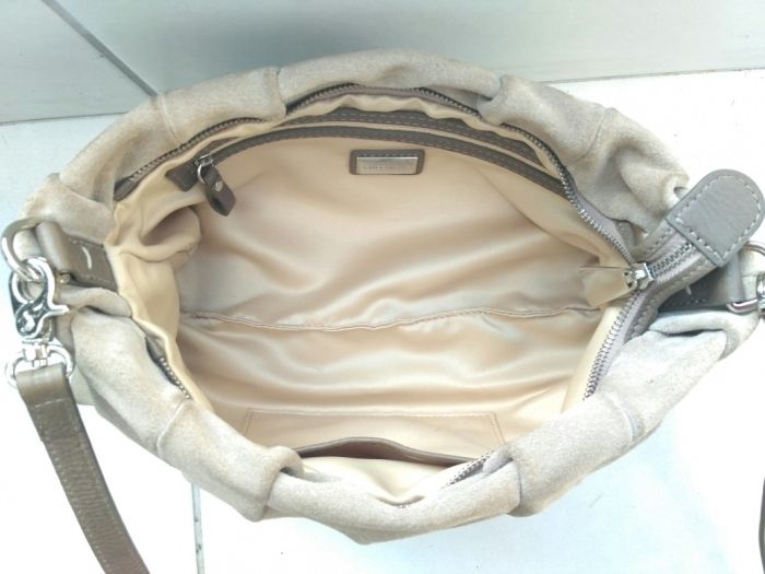 Włoska skórzana torebka Coccinelle