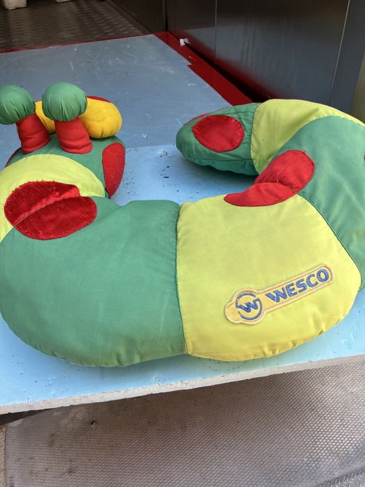 Protetor de acento em forma de lagarta