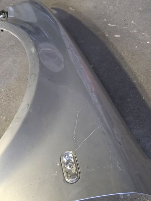 Guarda Lamas Esquerdo VW Passat B5.5