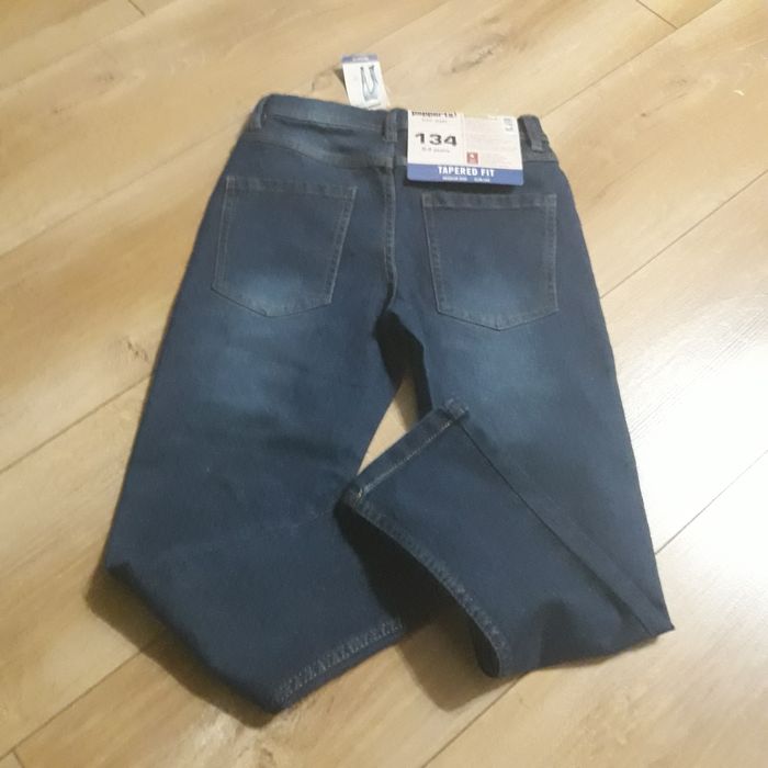 Nowe spodnie chłopięce roz.134