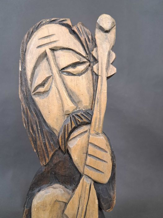 Muzykant, ludowa rzeźba drewniana, wys. 30 cm