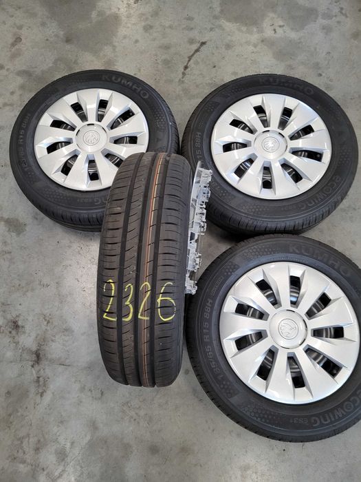 Koła 5 x 100 skoda oryginał opony 185 /65 15 kumho nowe kołpaki