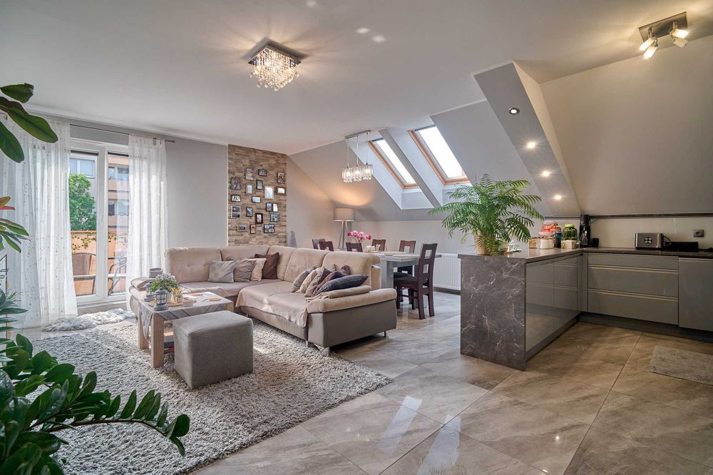 Przestronny apartament na sprzedaż w Złotowie - przestrzeń domu, wygoda śródmiejskiego życia!