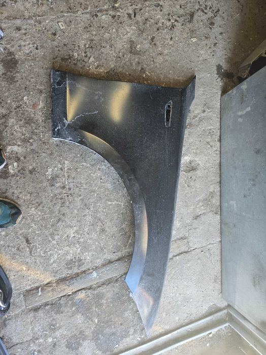 błotnik przód BMW seria 1 E81 E82 E87 E88 nowy