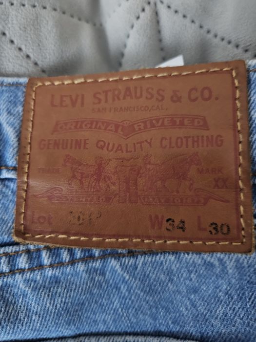 Niebieskie spodnie jeansowe męskie Levi's rozm 34