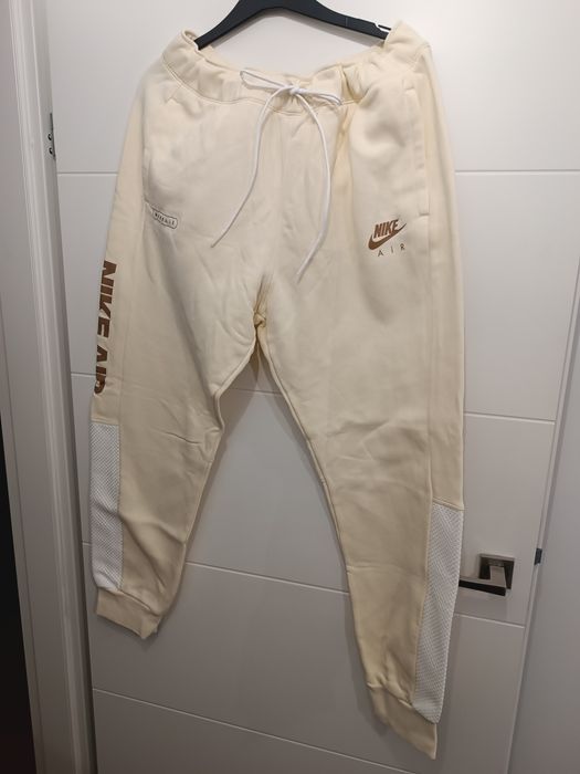 Oryginalne spodnie dresowe jasne Nike XL