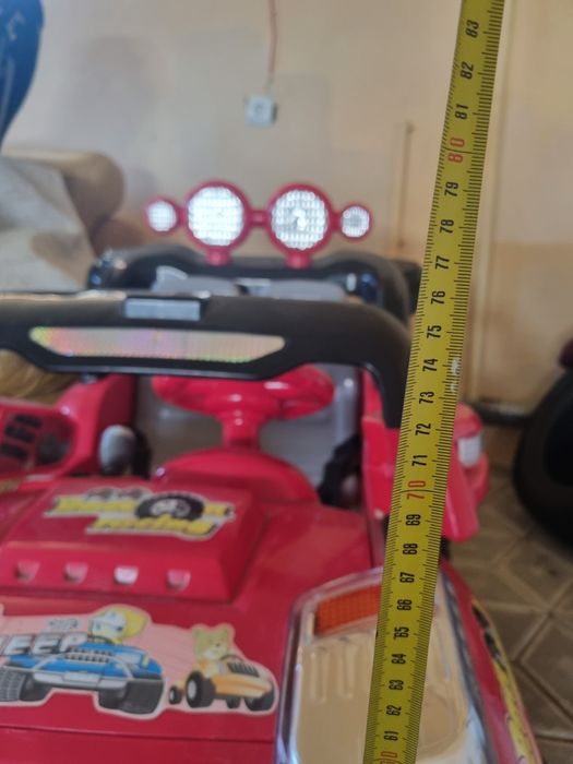 Дитяча машинка електрична