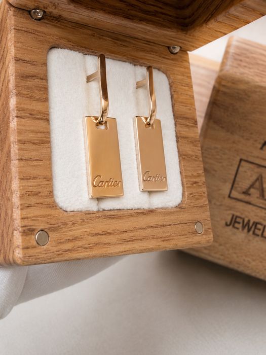 Золоті сережки 585 cartier вагою 6,6 г.