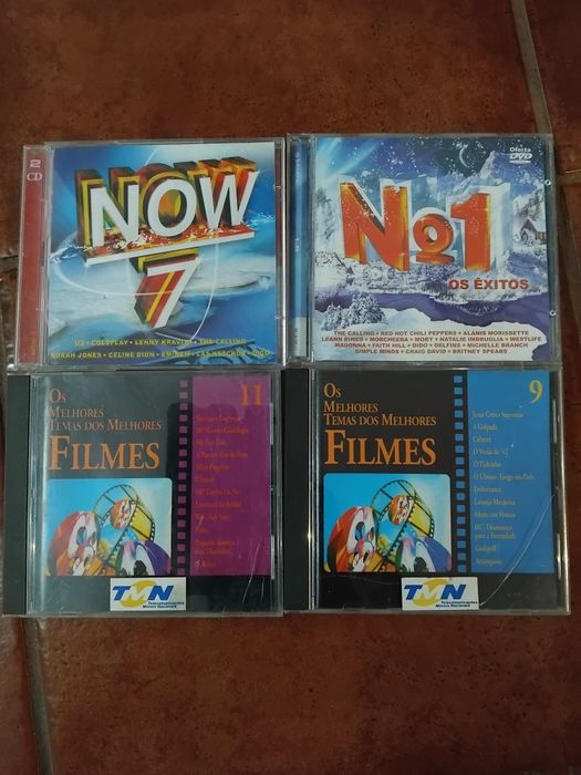 4 caixas de cds vazias (Now 7, No1, Os melhores temas dos filmes)