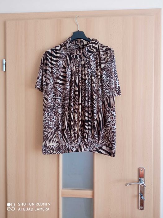 Damska elegancka bluzka wyjściowa 42