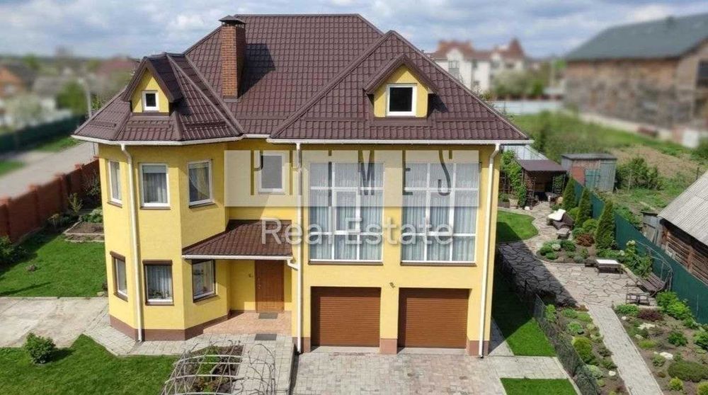 Продаж будинку з ремонтом, ділянка 10 соток, гараж на 2 авто, Гатне