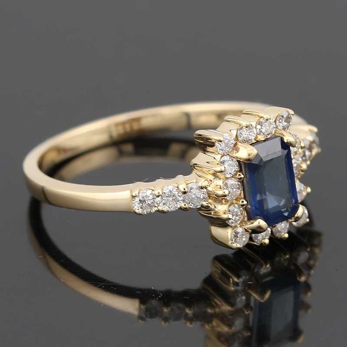 Złoty pierścionek z szafirem 0.60ct i diamentami 0.36ct 14K