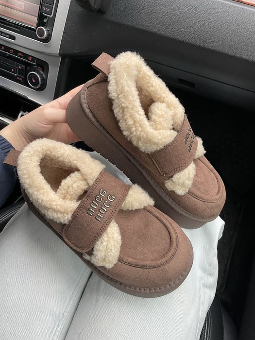 Коричневі жіночі чобітки