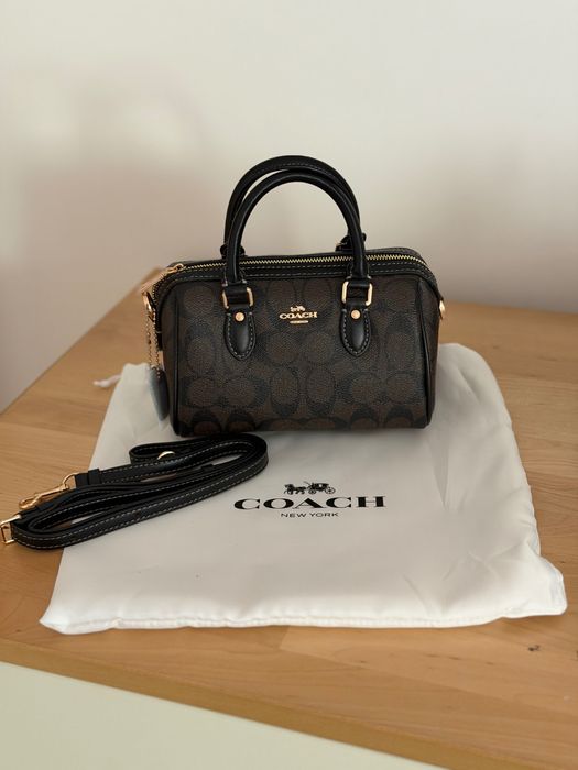 Bolsa coach castanha