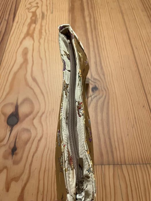 Bolsa pequena com figuras