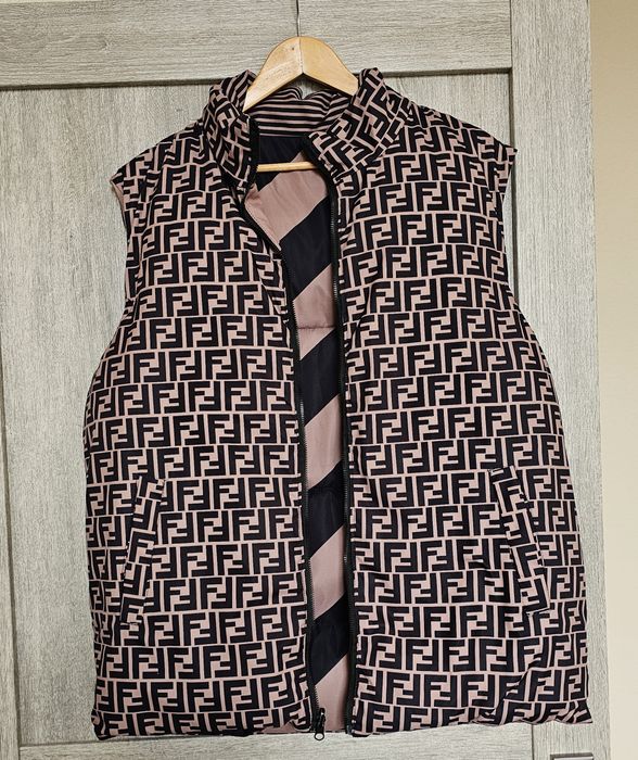 Жіноча двостороння жилетка