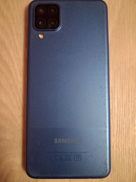 Телефон Самсунг а12