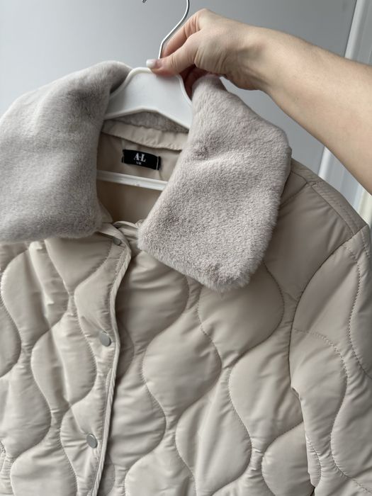 Жіноча стьобана куртка