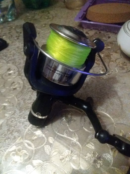 Kołowrotek Strike i wędkę Robinson