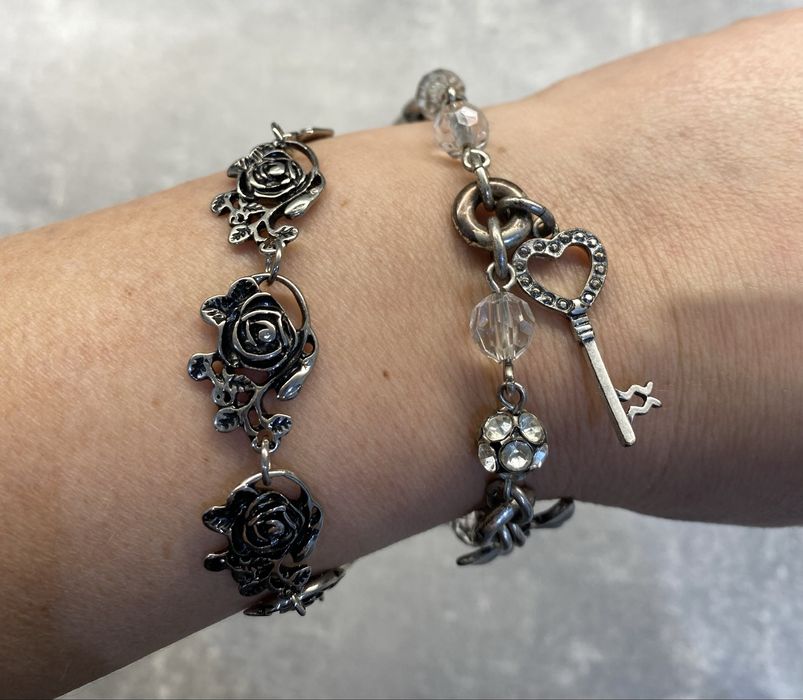 Zestaw biżuterii bransoletki pierścionki zegarki wisiorki