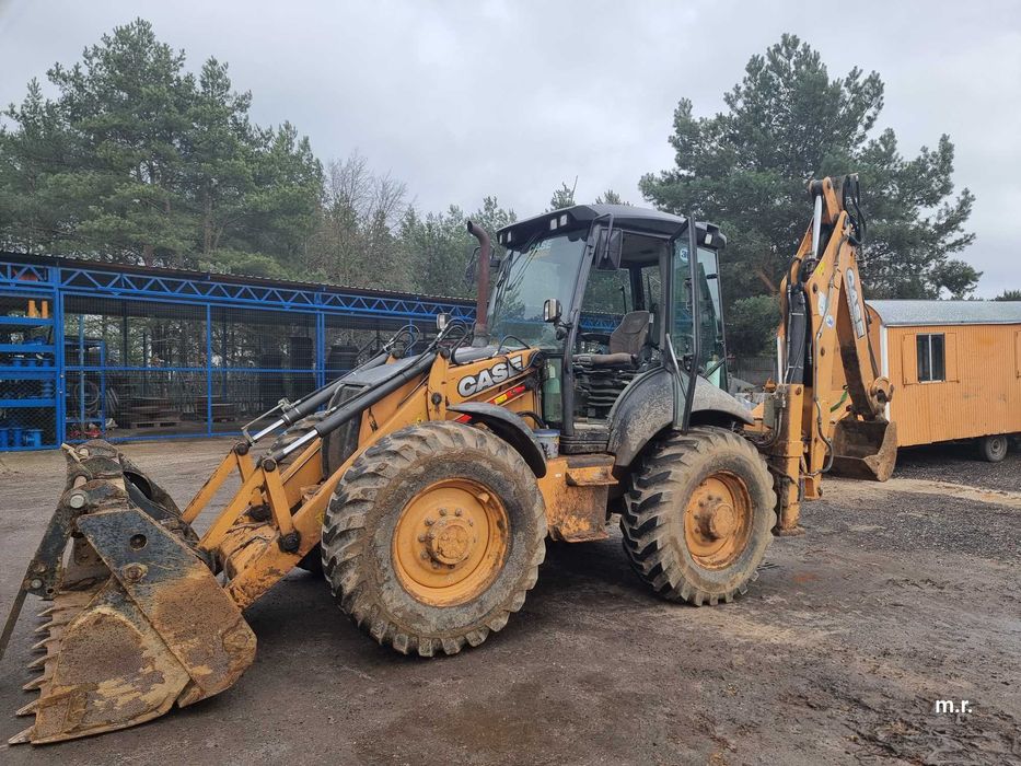 Case 695 ST Koparko ładowarka