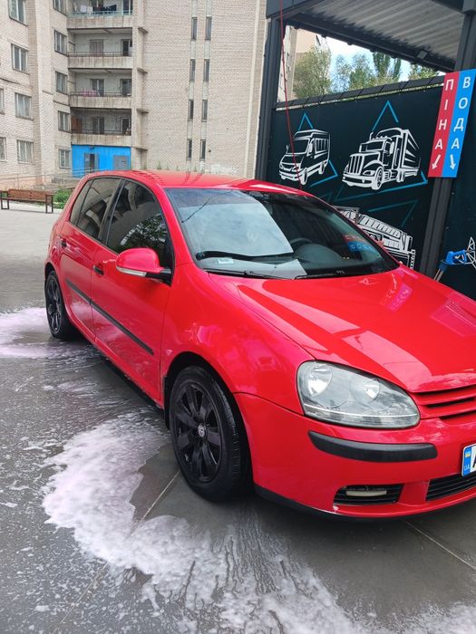 Машину гольф 5 .