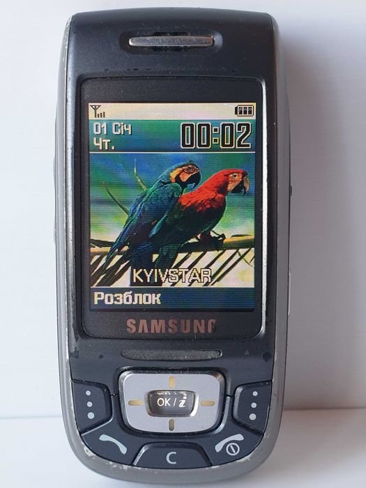 телефон samsung d500 + навушники зарядне