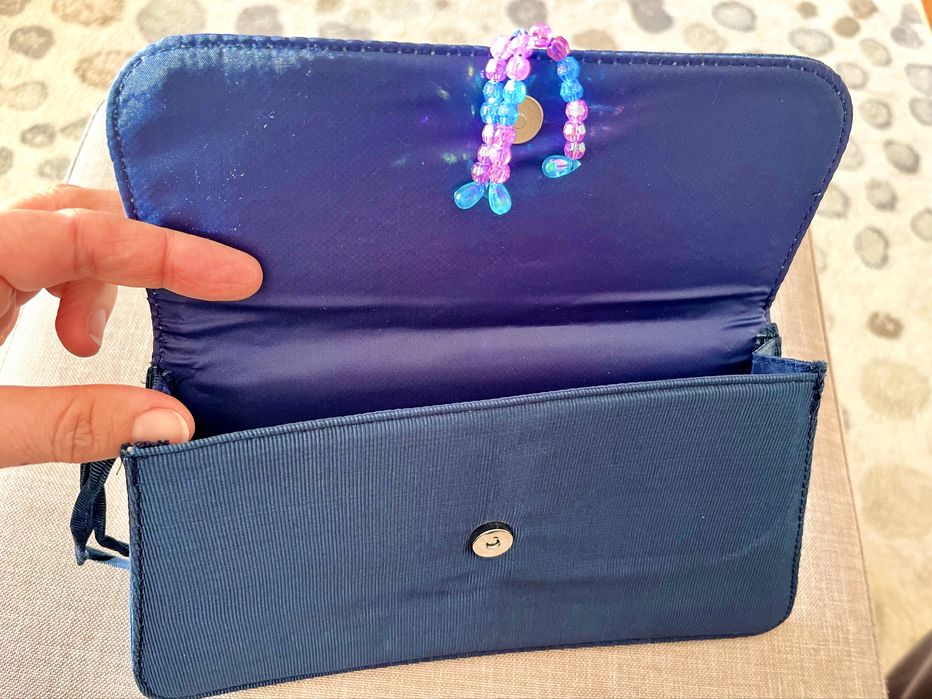 Mala clutch AVON nova