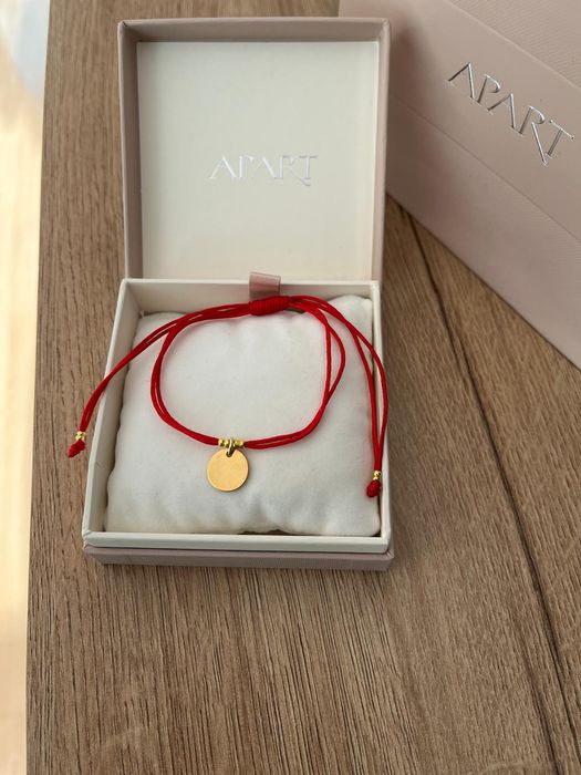 Nowa bransoletka na sznurku czerwona Apart, złote kółeczko