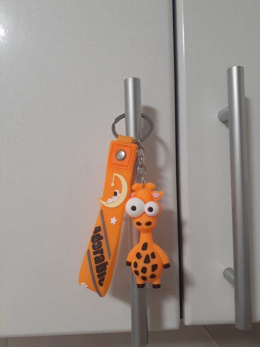 Новый Брелок силикон (жираф глаза)