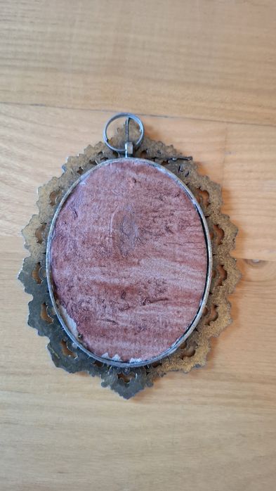 Portrety w ramkach z mosiądzu