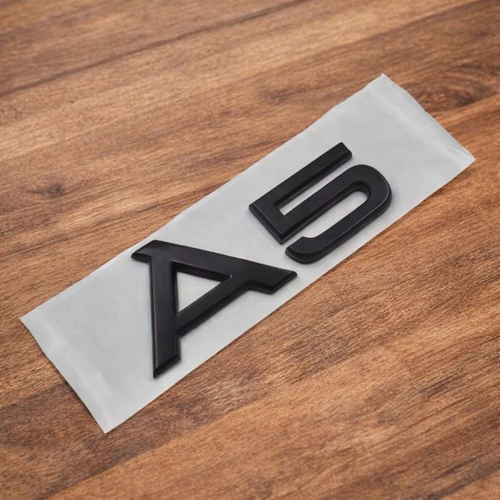 Emblematy Audi Czarny Połysk Znaczki A1 A3 A4 A5 A6 A7 Q3 Q5 Q7 S Line