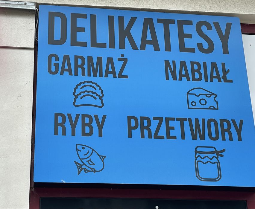 Szyld reklamowy Delikatesy -podświetlany
