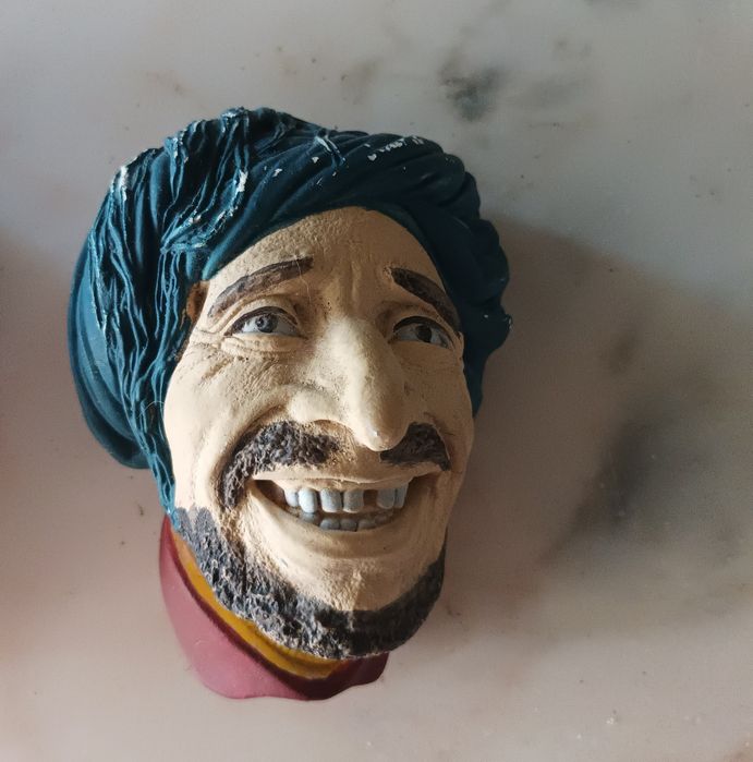 Estátuas cara em gesso