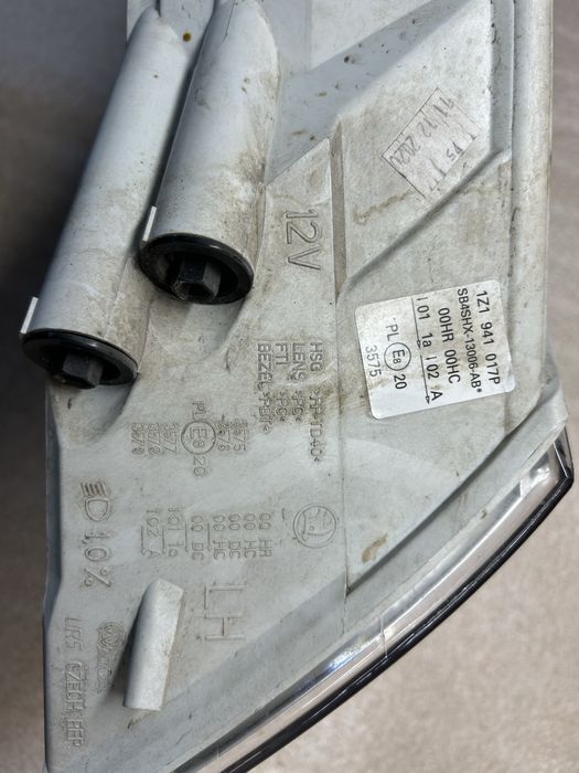 Reflektor  lewy lampa Octavia 04-08