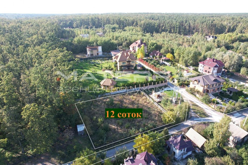 Стоянка продаж ділянки 12 соток в оточенні лісу