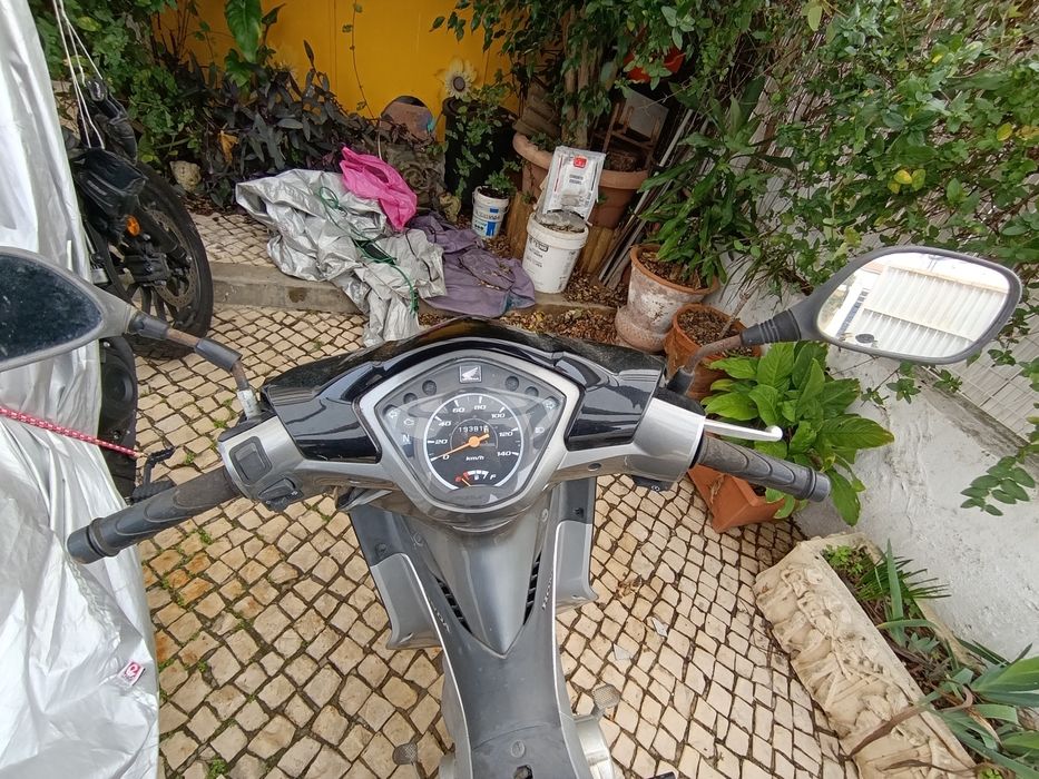 Honda Wave 110I - 04 tempos