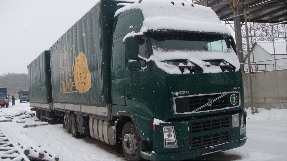 Вольво фн12 VOLVO і причіп SCHMITZ