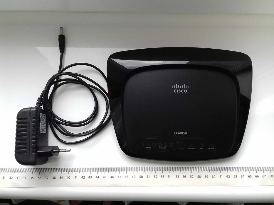 Linksys Cisco Wireless-G WAG54G2 + ADSL2+ Modem Router Gateway, ST400H